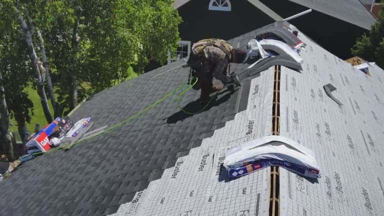 Low-slope commercial roof with vents and a parapet